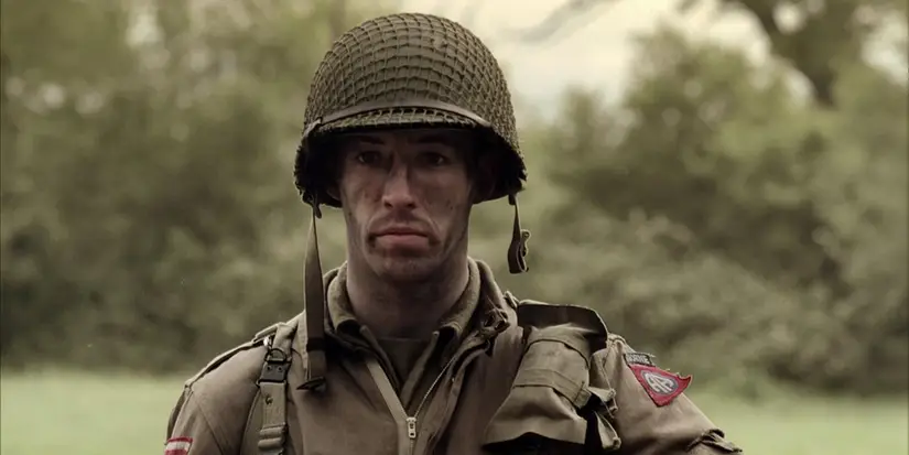 Benjamin Montague looking at something off-screen in Band of Brothers, Day of Days