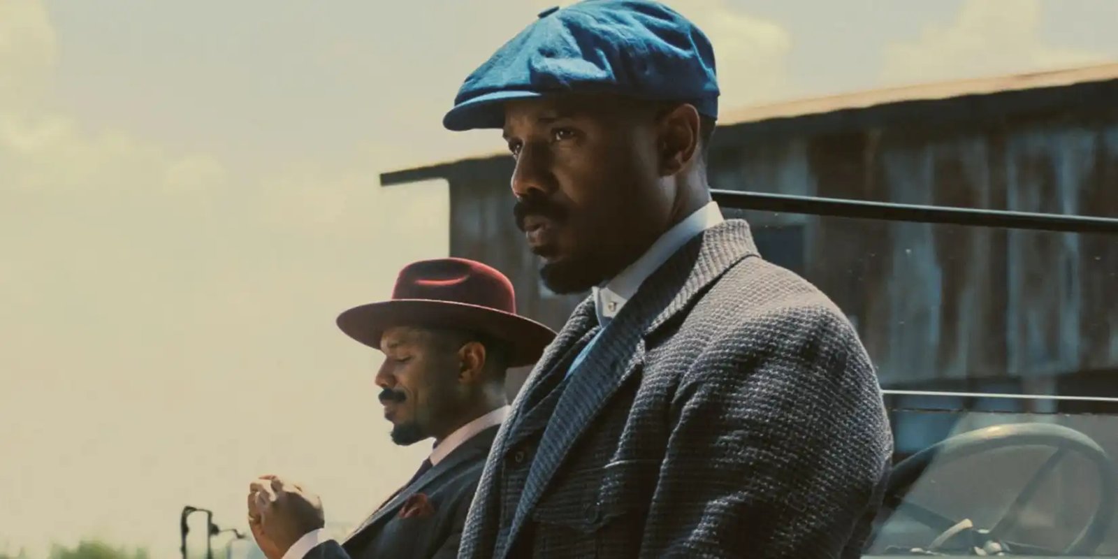 Michael B. Jordan as the Smokestack Twins in an early scene from Sinners (2025)