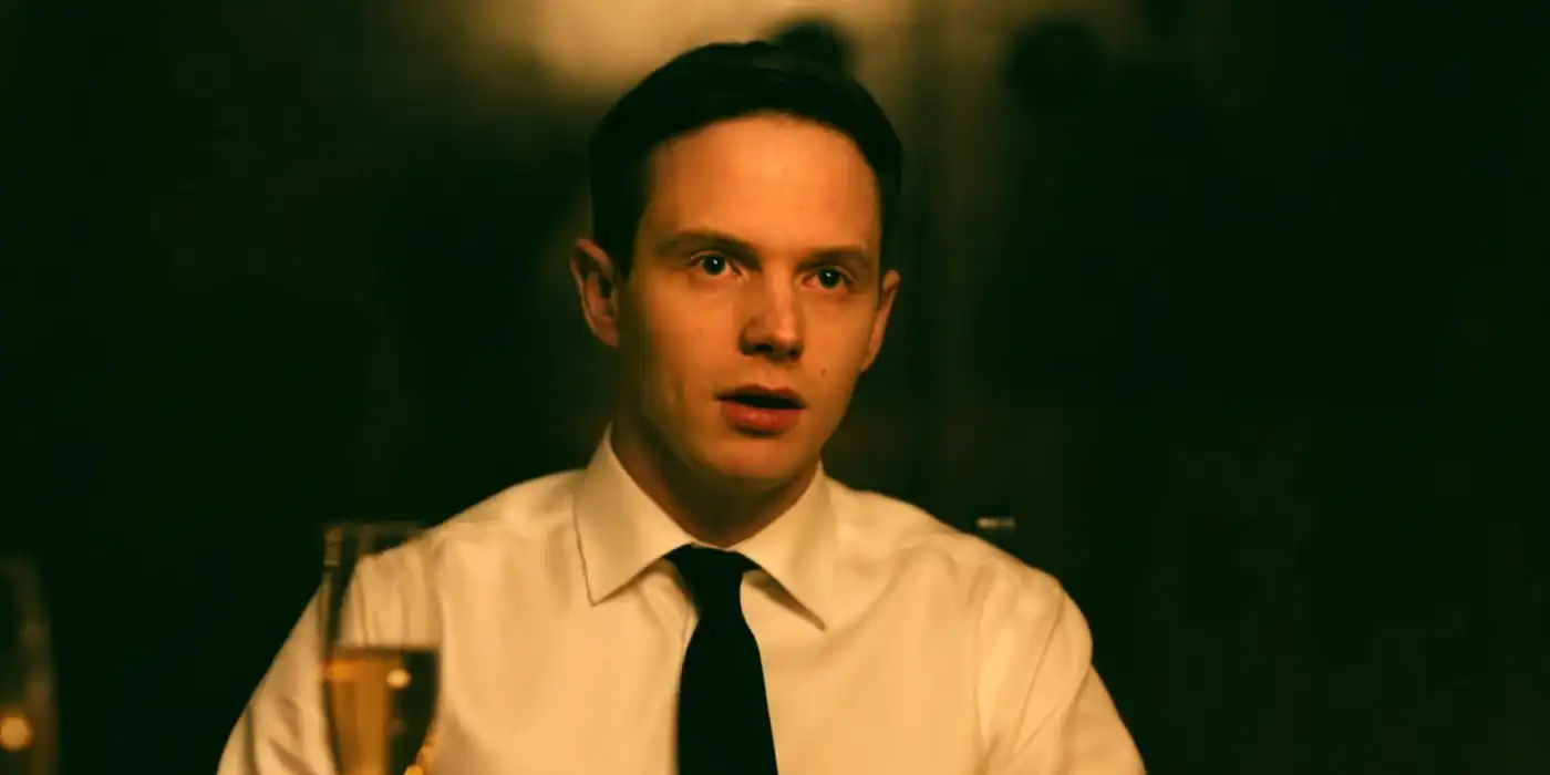 Alex Le Domas speaking with a champagne in front of him in Ready or Not